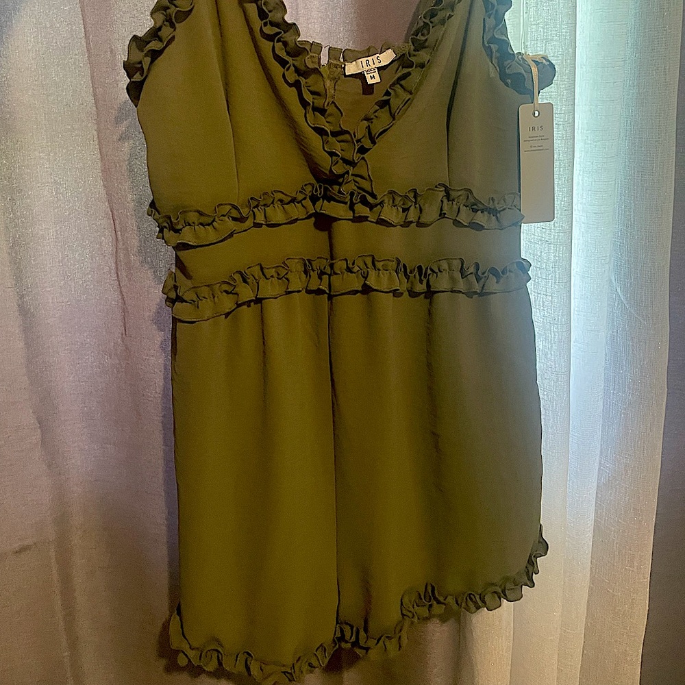 Never been used Green romper. With tags